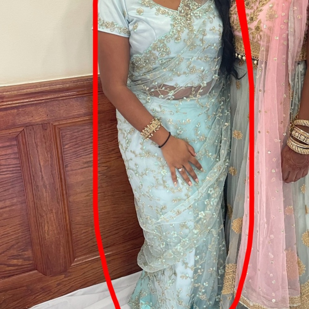 Elegant Light Blue Saree with Gold Accents